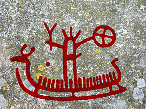 Petroglyph with boat and axis mundi